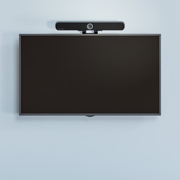 Eine Sennheiser TeamConnect Videobar ist oberhalb eines Wanddisplays per VESA-Halterung montiert – eine platzsparende und professionelle Lösung für feste Videokonferenzinstallationen in Meeting- und Konferenzräumen.