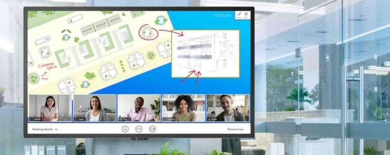 Ein ultrabreites 21:9 LED-Display von Leyard zeigt in einem modernen Glasbüro eine hybride Besprechung mit Videokonferenzteilnehmern und einer digitalen Präsentation, optimiert für Microsoft Teams Front Row und kollaboratives Arbeiten.